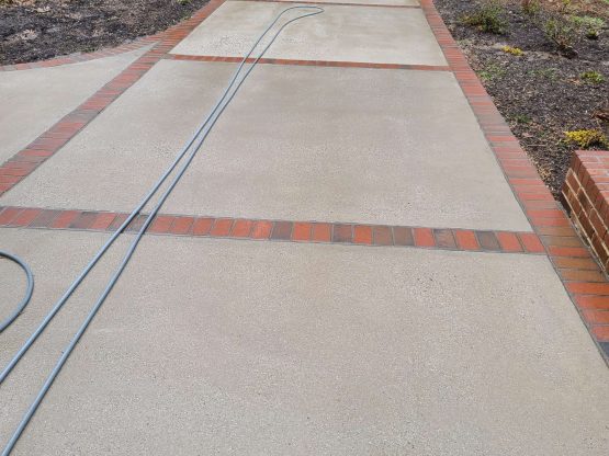 concrete washing driveway pressure washing